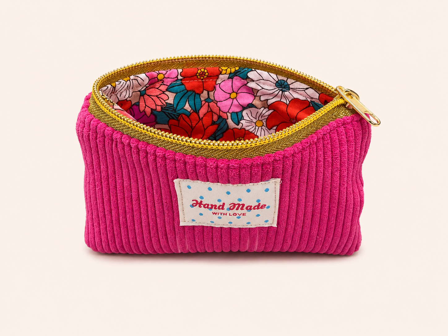 La mini pochette fuchsia bloom