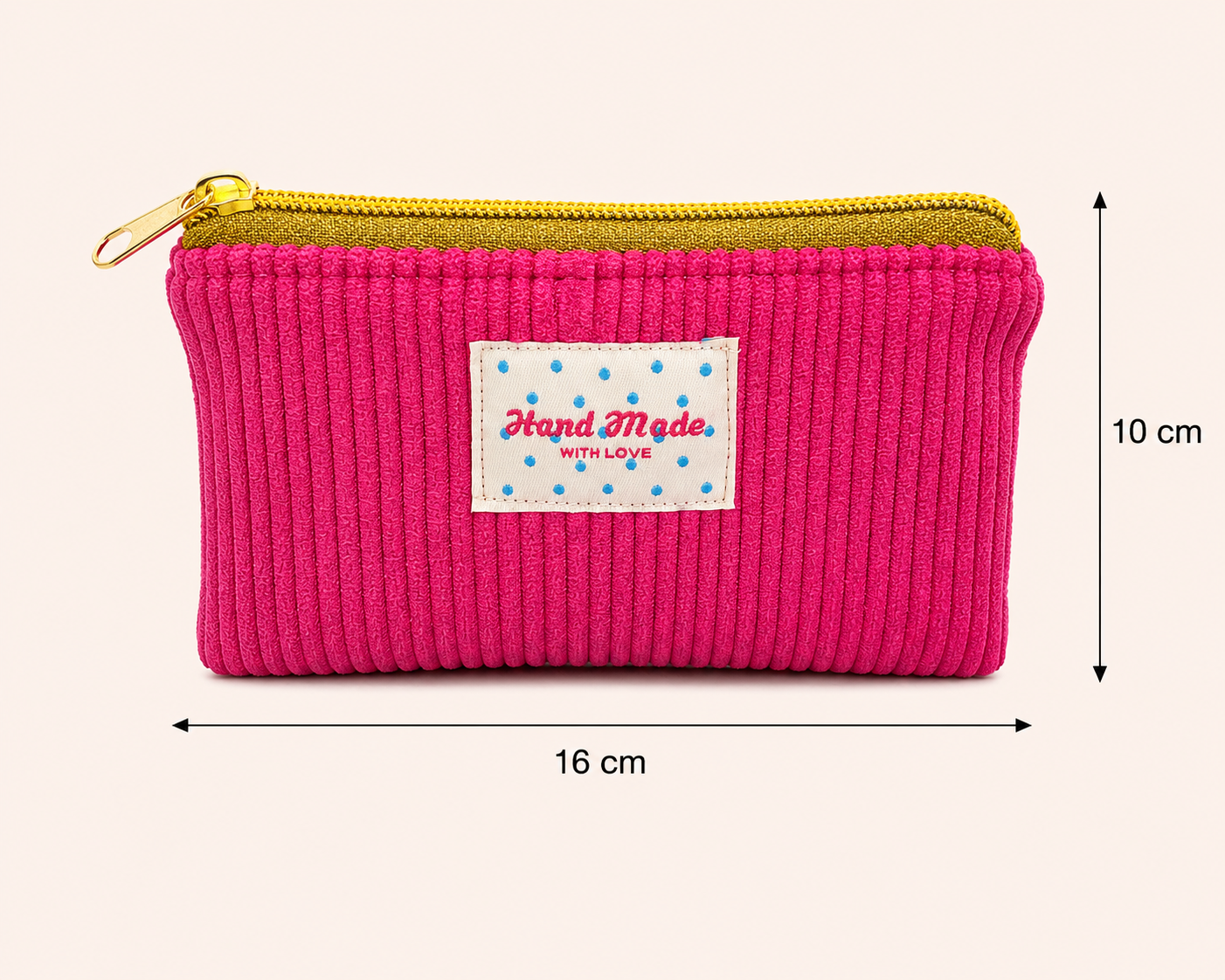 La mini pochette fuchsia bloom